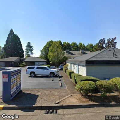 Thumbnail image of the front of a dentist office practice with the name Natural Dentures & Implant Center which is located in Corvallis, OR