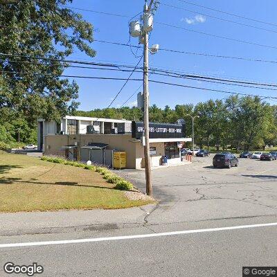 Thumbnail image of the front of a dentist office practice with the name Amerident Dental which is located in Dracut, MA