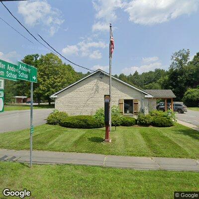 Thumbnail image of the front of a dentist office practice with the name Sinclair & Mayott which is located in Chester, VT