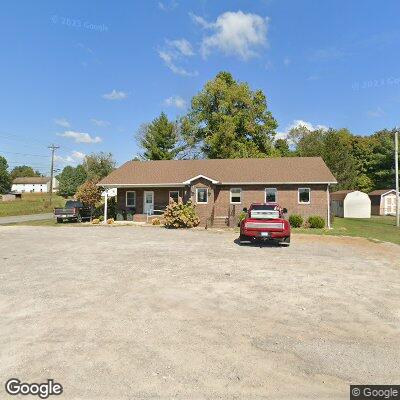 Thumbnail image of the front of a dentist office practice with the name Johnson Dental which is located in Tompkinsville, KY