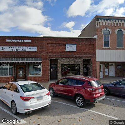 Thumbnail image of the front of a dentist office practice with the name Sigourney Smiles which is located in Sigourney, IA