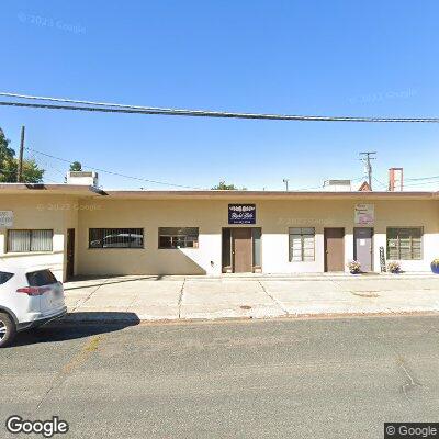 Thumbnail image of the front of a dentist office practice with the name Blue Mountain Denture Center which is located in Baker City, OR