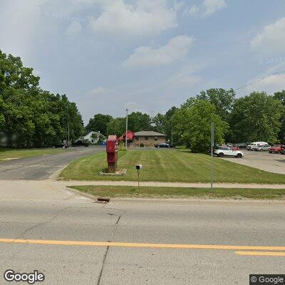 Thumbnail image of the front of a dentist office practice with the name Village Dental Center which is located in Goodrich, MI