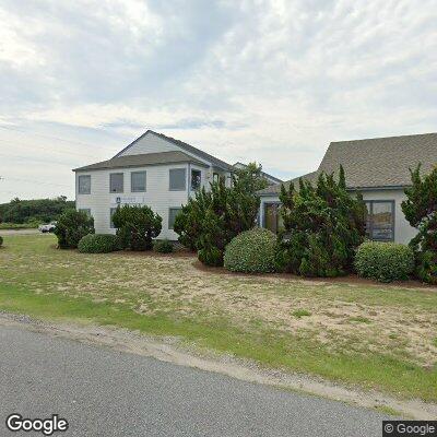 Thumbnail image of the front of a dentist office practice with the name Coastal Endodontics which is located in Kill Devil Hills, NC