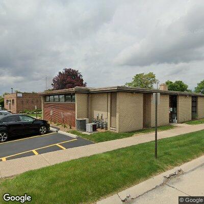 Thumbnail image of the front of a dentist office practice with the name Booker Family Dentistry which is located in Trenton, MI