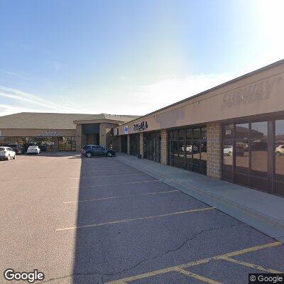 Thumbnail image of the front of a dentist office practice with the name Neighborhood Dental Clinic which is located in Harrisburg, SD