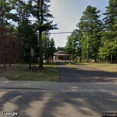 Thumbnail image of the front of a dentist office practice with the name Peter Christensen Dental Clinic which is located in Lac Du Flambeau, WI