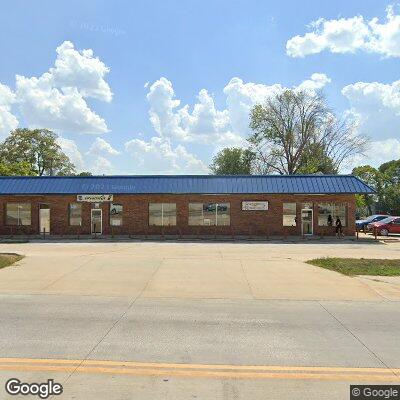 Thumbnail image of the front of a dentist office practice with the name Dr Tracy Dental Clinic which is located in Harrisonville, MO