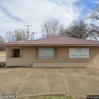 Thumbnail image of the front of a dentist office practice with the name Rock Family Dental which is located in Brinkley, AR