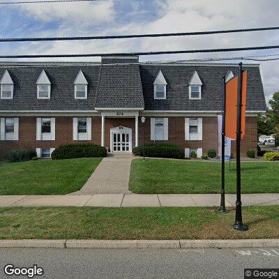 Thumbnail image of the front of a dentist office practice with the name Caring Family Dental which is located in Wayne, NJ