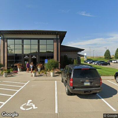 Thumbnail image of the front of a dentist office practice with the name Mann Orthodontics which is located in Grimes, IA