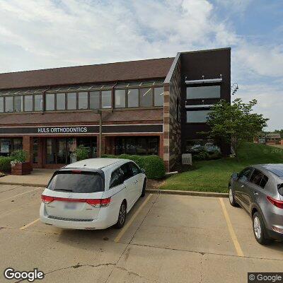 Thumbnail image of the front of a dentist office practice with the name Outstanding Orthodontic Care which is located in Champaign, IL