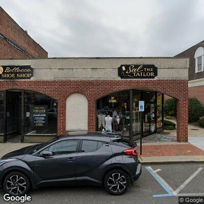 Thumbnail image of the front of a dentist office practice with the name Quezada & Vieyra Dental which is located in Glen Cove, NY