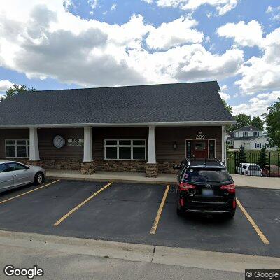 Thumbnail image of the front of a dentist office practice with the name Village Smiles which is located in Westphalia, MI