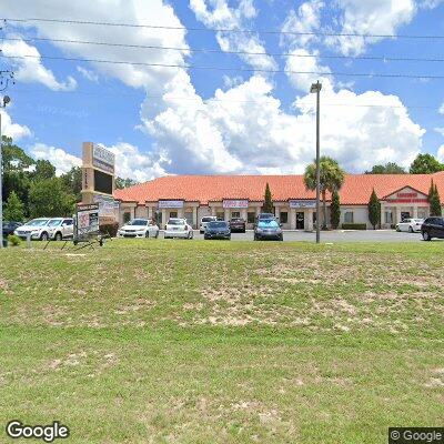 Thumbnail image of the front of a dentist office practice with the name Magnolia Dental which is located in Summerfield, FL