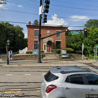 Thumbnail image of the front of a dentist office practice with the name DR Jean Resnevic Dent which is located in Greenville, RI