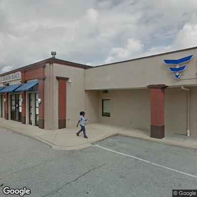 Thumbnail image of the front of a dentist office practice with the name Kool Smiles which is located in Baltimore, MD