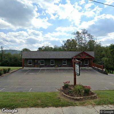 Thumbnail image of the front of a dentist office practice with the name Ashley Flowers Family Dentistry which is located in Sparta, NC