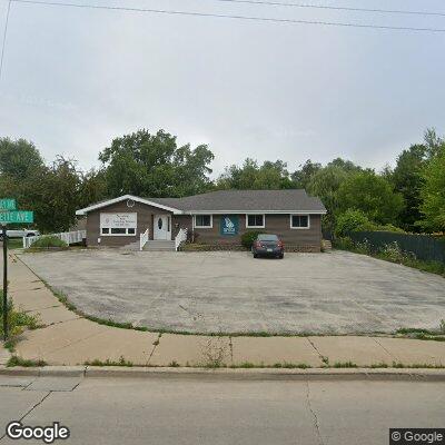 Thumbnail image of the front of a dentist office practice with the name DR John D Magnin Dentist which is located in Marinette, WI