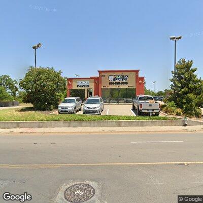 Thumbnail image of the front of a dentist office practice with the name The Smiley Tooth Pediatric Dental Specialists which is located in Sulphur Springs, TX