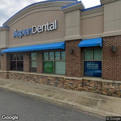 Thumbnail image of the front of a dentist office practice with the name Aspen Dental which is located in Panama City Beach, FL