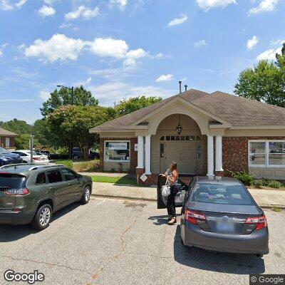 Thumbnail image of the front of a dentist office practice with the name Cowherd Family Dental which is located in Fayetteville, NC