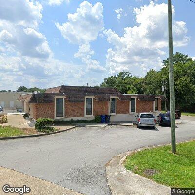 Thumbnail image of the front of a dentist office practice with the name Caring Comm Dental Clinic which is located in Jacksonville, NC