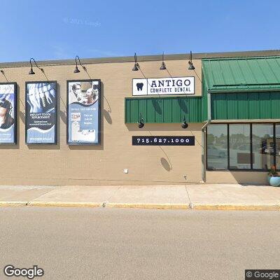 Thumbnail image of the front of a dentist office practice with the name Antigo's Complete Dental Center which is located in Antigo, WI