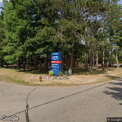 Thumbnail image of the front of a dentist office practice with the name Northwoods Dental Clinic which is located in Woodruff, WI