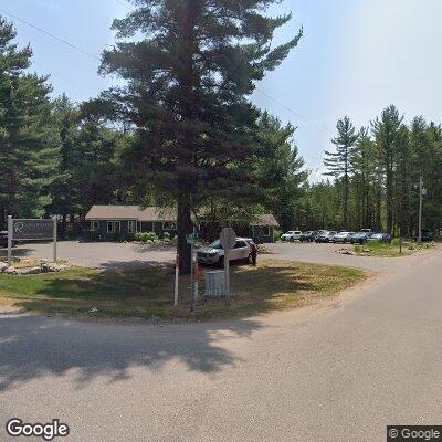 Thumbnail image of the front of a dentist office practice with the name Rasmussen Dental which is located in Minocqua, WI