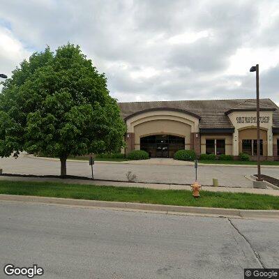 Thumbnail image of the front of a dentist office practice with the name Harmony Smiles Orthodontics which is located in Raymore, MO