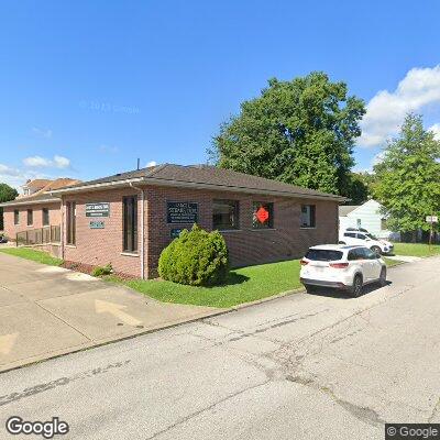 Thumbnail image of the front of a dentist office practice with the name Stadium Denture Center which is located in Parkersburg, WV