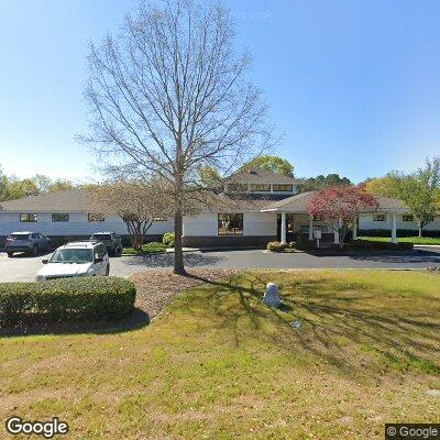 Thumbnail image of the front of a dentist office practice with the name Smile Dental which is located in Sunset Beach, NC