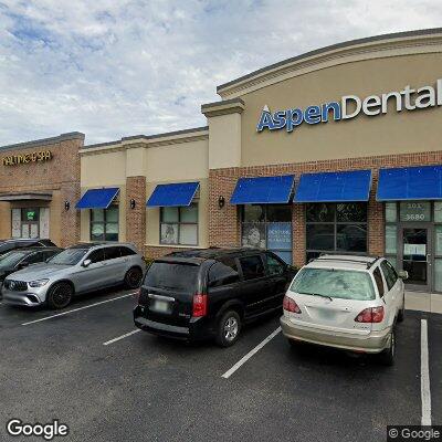 Thumbnail image of the front of a dentist office practice with the name Aspen Dental which is located in Tampa, FL