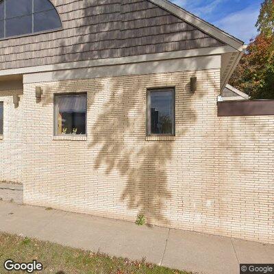 Thumbnail image of the front of a dentist office practice with the name Washington Dental which is located in Marquette, MI