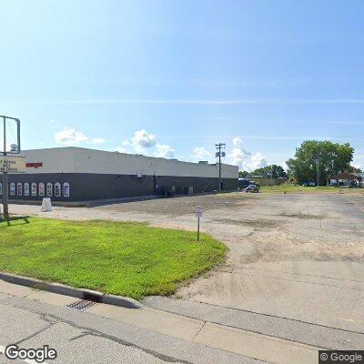 Thumbnail image of the front of a dentist office practice with the name Smile Care Dental Center which is located in La Crosse, WI