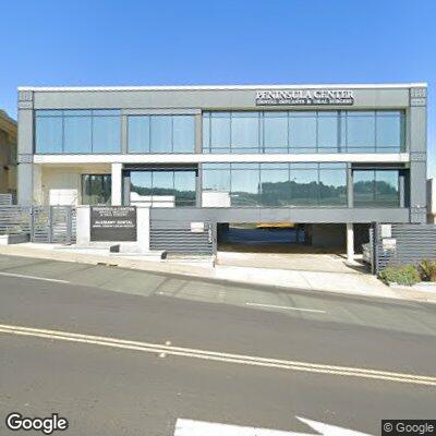 Thumbnail image of the front of a dentist office practice with the name Peninsula Center Dental Implants & Oral Surgery which is located in Daly City, CA