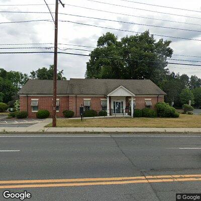 Thumbnail image of the front of a dentist office practice with the name Smiles & Faces which is located in Wilbraham, MA