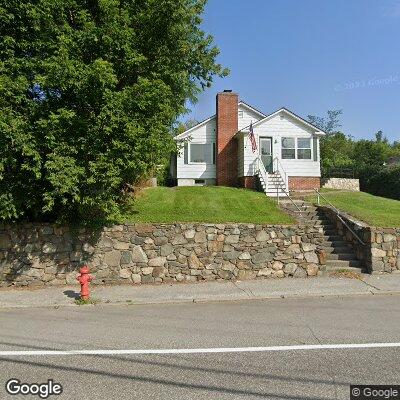 Thumbnail image of the front of a dentist office practice with the name N H Smiles which is located in Littleton, NH