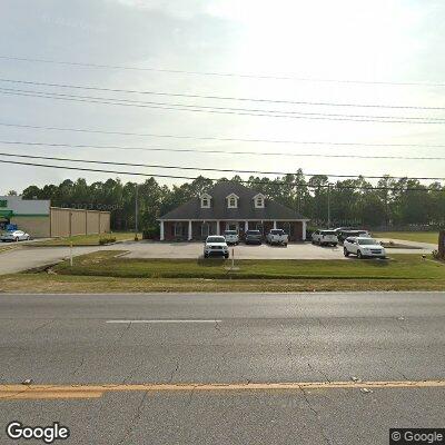 Thumbnail image of the front of a dentist office practice with the name Chapman, Family Dentistry which is located in Ocean Springs, MS