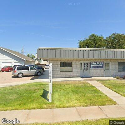 Thumbnail image of the front of a dentist office practice with the name Encompass Dental Studios which is located in Columbus, NE