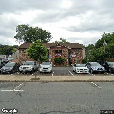 Thumbnail image of the front of a dentist office practice with the name Wilson Orthodontics PLLC which is located in Florence, MA