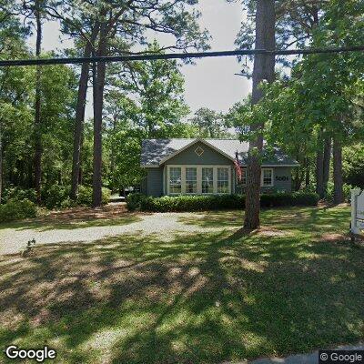 Thumbnail image of the front of a dentist office practice with the name Living Oaks Dental which is located in Fairhope, AL