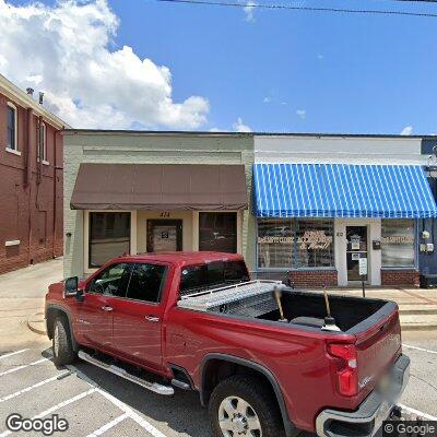 Thumbnail image of the front of a dentist office practice with the name Smiles Dental Lab which is located in West Point, GA