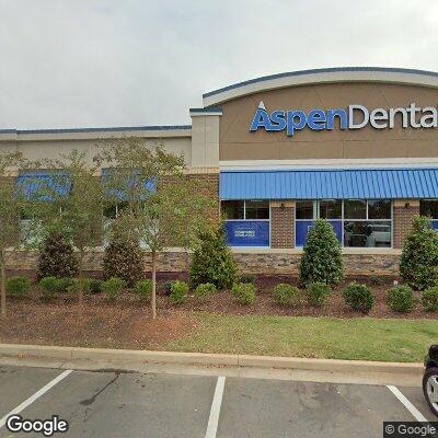 Thumbnail image of the front of a dentist office practice with the name Aspen Dental which is located in Mebane, NC