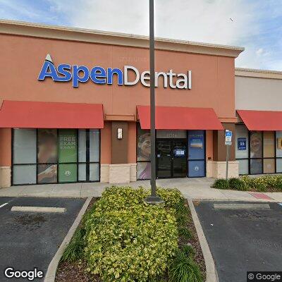 Thumbnail image of the front of a dentist office practice with the name Aspen Dental which is located in Mount Dora, FL