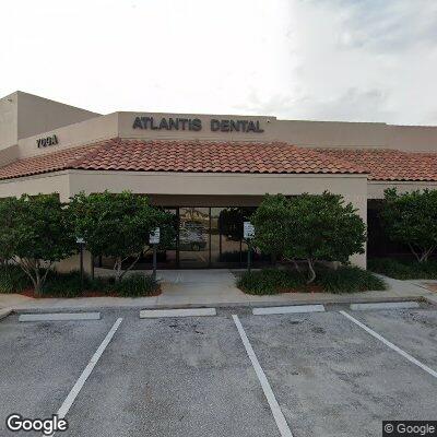 Thumbnail image of the front of a dentist office practice with the name Evenly Orthodontics which is located in Atlantis, FL