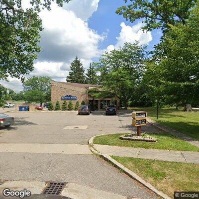 Thumbnail image of the front of a dentist office practice with the name Creekwood Dental which is located in Burton, MI