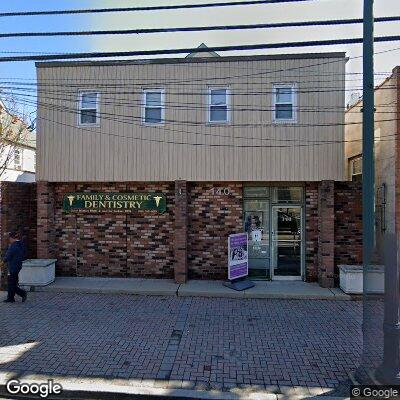 Thumbnail image of the front of a dentist office practice with the name Mineola Smiles which is located in Mineola, NY