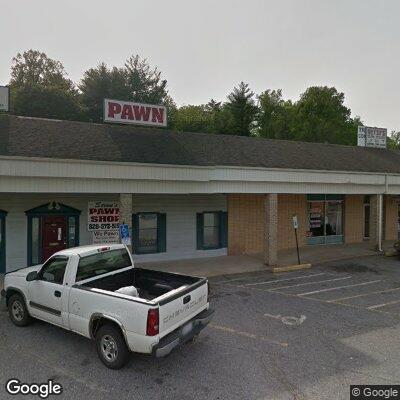 Thumbnail image of the front of a dentist office practice with the name Carolina Dental Care Center which is located in Lenoir, NC